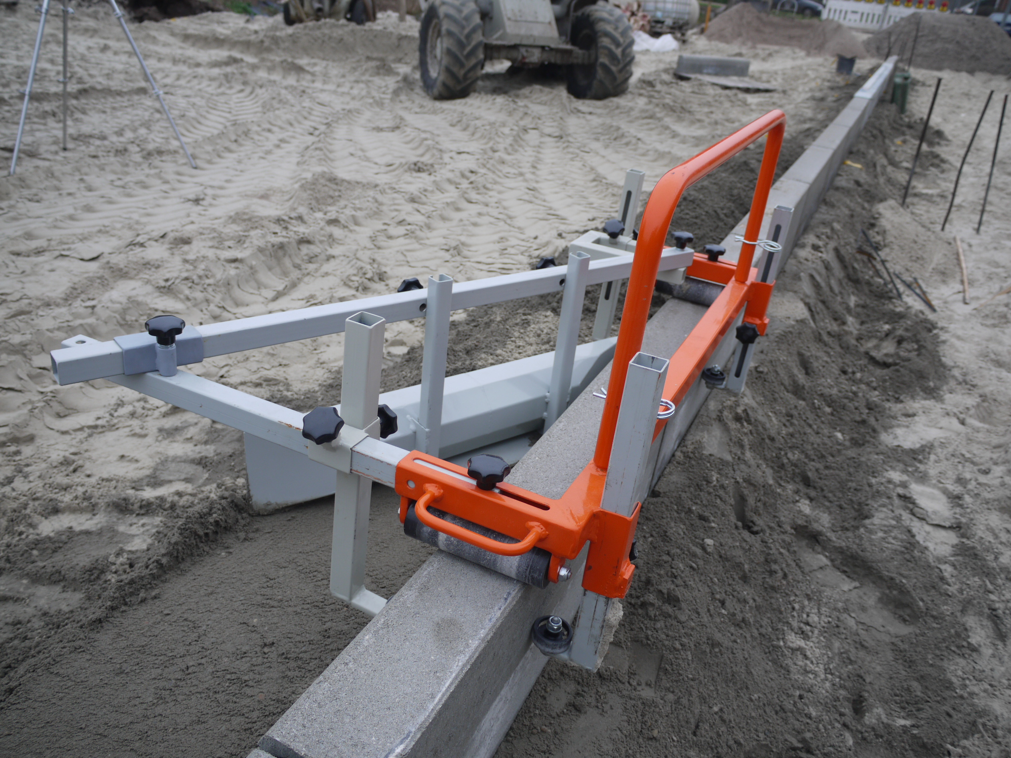 Système de nivellement de béton avec chariot guide
